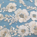 Tissu en dentelle à sequins avec broderie de fleurs de prunier